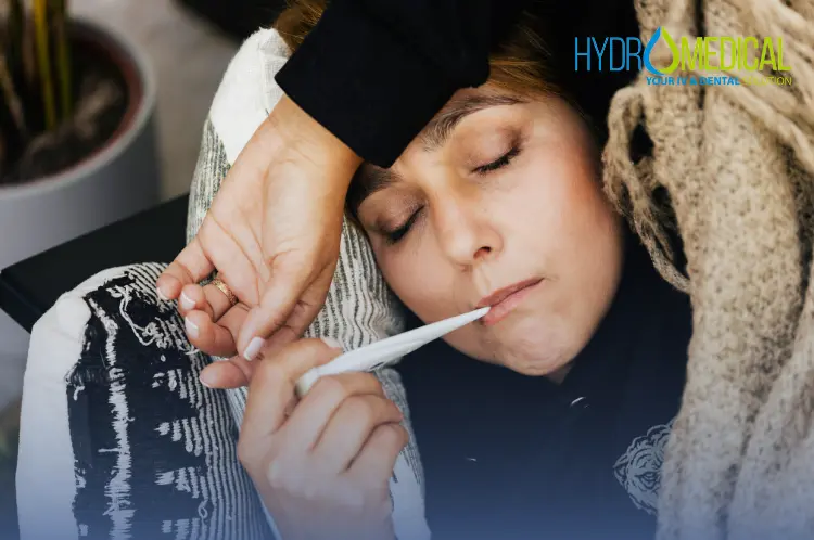 Hydro Medical doctor listening to a patient's chest with a stethoscope during an at-home consultation for flu in Bali.