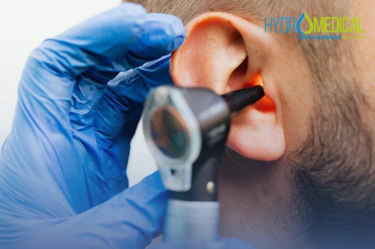 ENT Specialist in Bali treating a patient for Swimmer's Ear (ear infection).