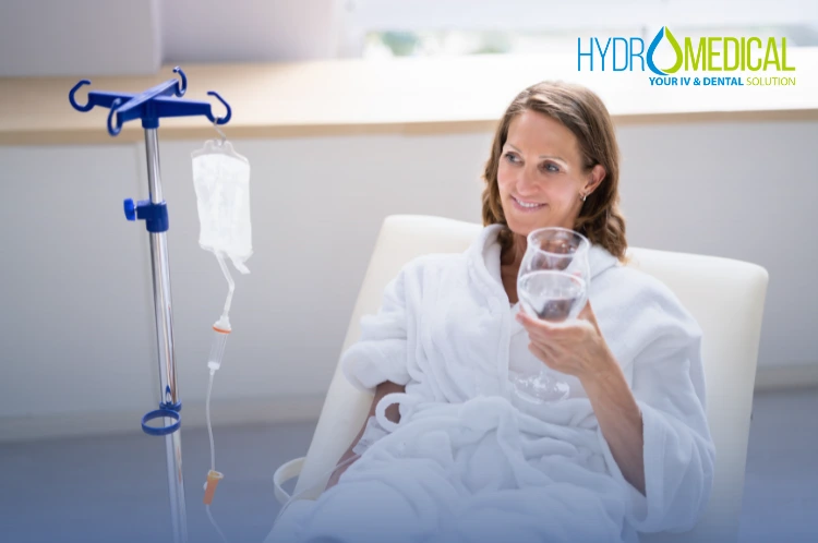 Patient comfortably receiving an IV Drip for "Bali Belly" treatment at Hydro Medical Clinic in Canggu.