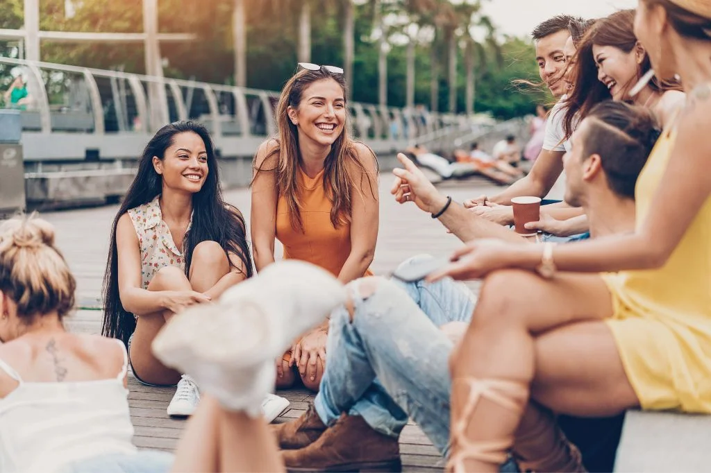 A group of young tourists in Canggu responsibly enjoying the hangout, aware of health and STD prevention.