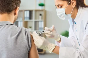 A doctor injecting a rabies vaccine to a patient at Hydro Medical