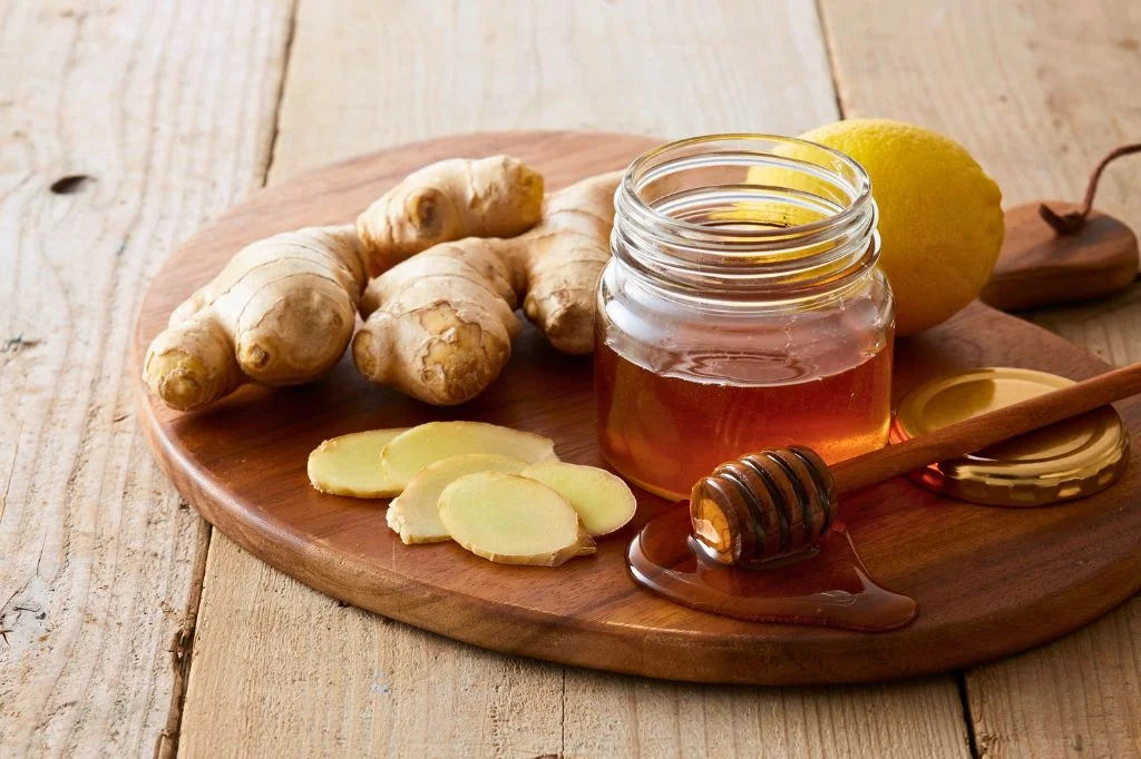 Natural remedies like ginger tea, lemon, and honey are safe first-line treatments for sore throats during pregnancy.