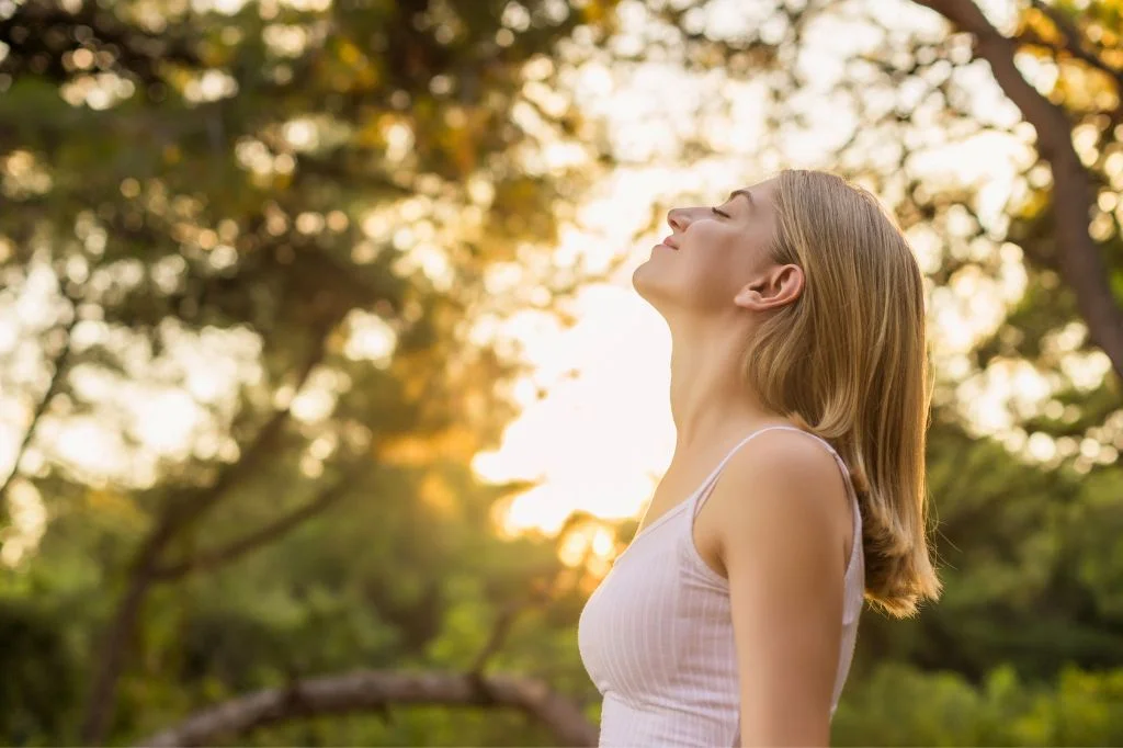 A tourist breathing freely in Bali after getting a treatment for Deviated Septum 