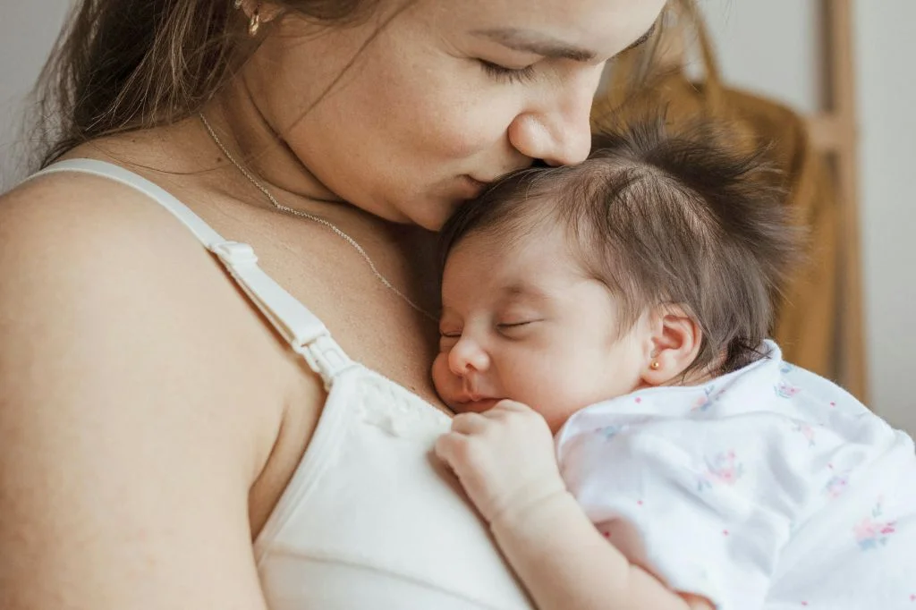 A mother in Bali focusing on safe postpartum recovery and healing her core after pregnancy.