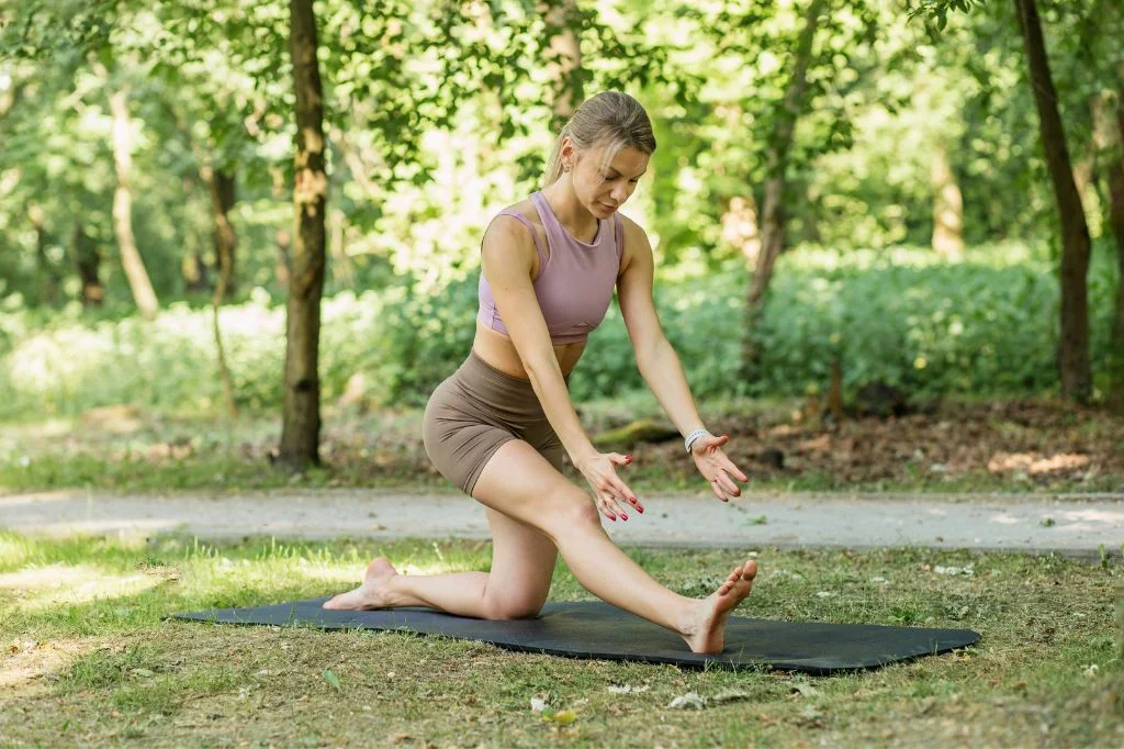 A person enjoying a pain-free yoga session in Bali after a successful internal medicine consultation.