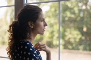 A patient in Bali reflecting on their overlapping health symptoms before seeking a specialist diagnosis.