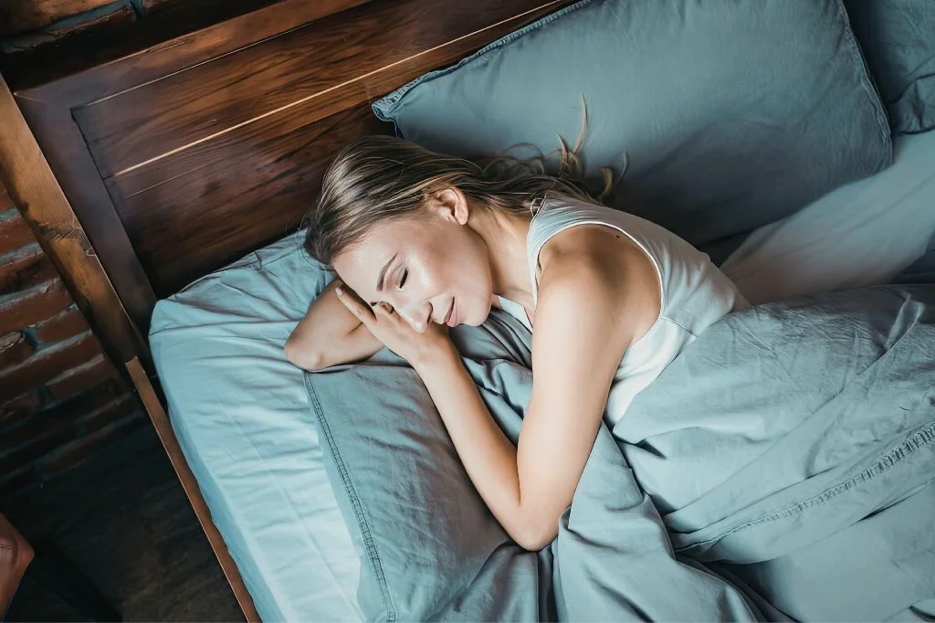A person sleeping peacefully without a sleep apnea after the treatment 