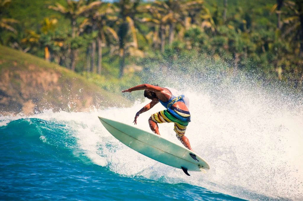 Surfers and athletes in Bali face extreme dehydration risks due to high humidity and tropical sun.