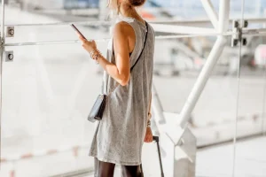 A well-rested traveler preparing for a flight home after IV therapy in Bali.