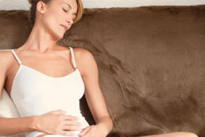 A traveler recovering from stomach distress in a Bali villa.