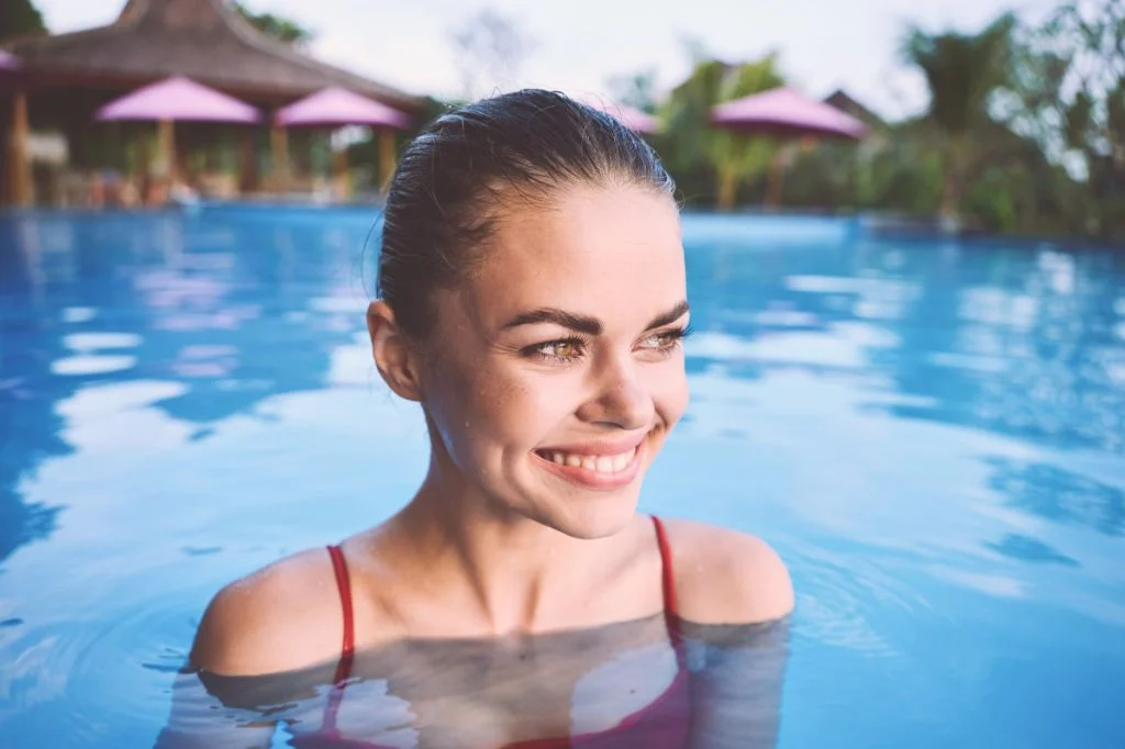 Confident smile with white teeth after dental treatment.