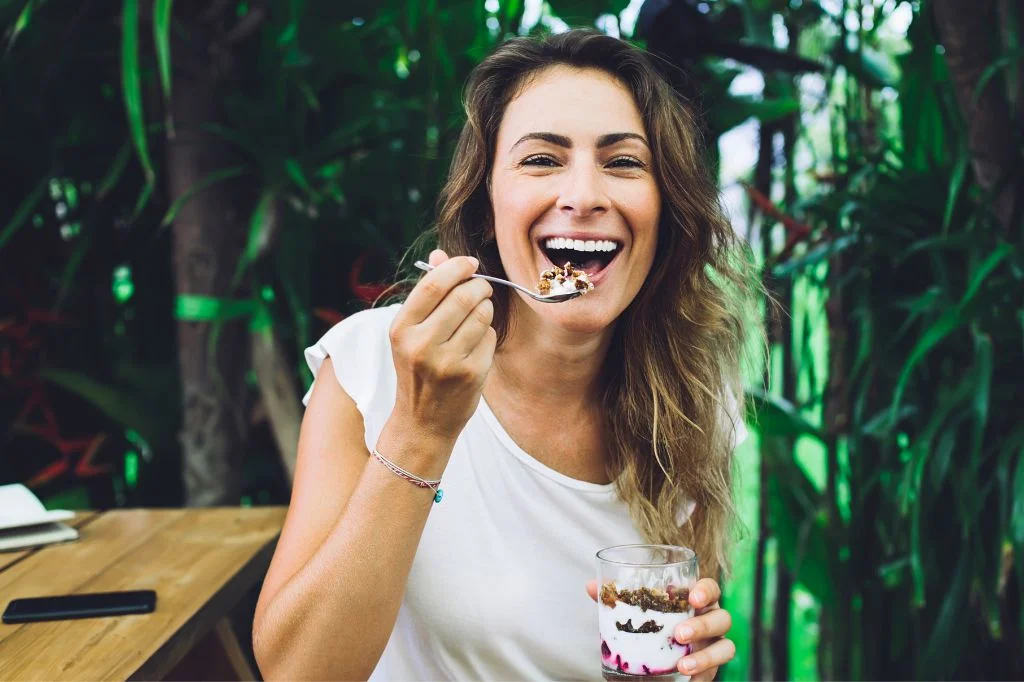 A confident, flawless smile after a successful dead tooth restoration.