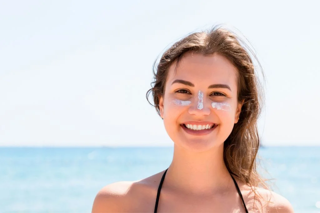 Happy patient enjoying a post-treatment holiday in Bali with a confident smile.