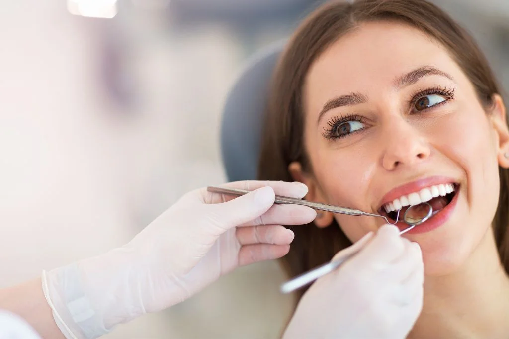 Professional dental examination for molar cavities in Bali.