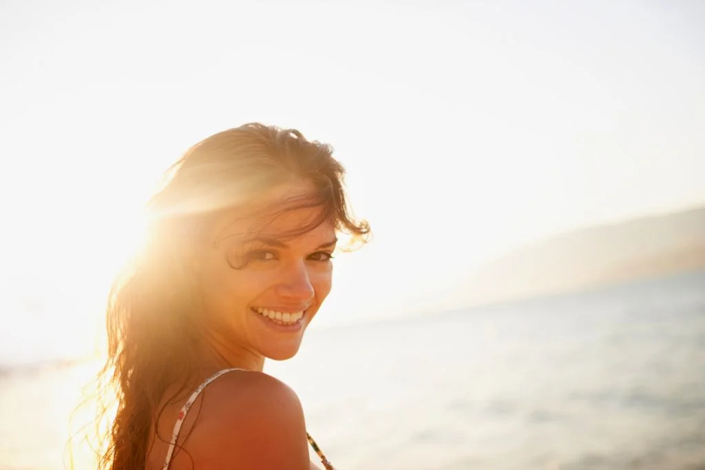 A radiant smile at Batu Bolong beach, Bali.