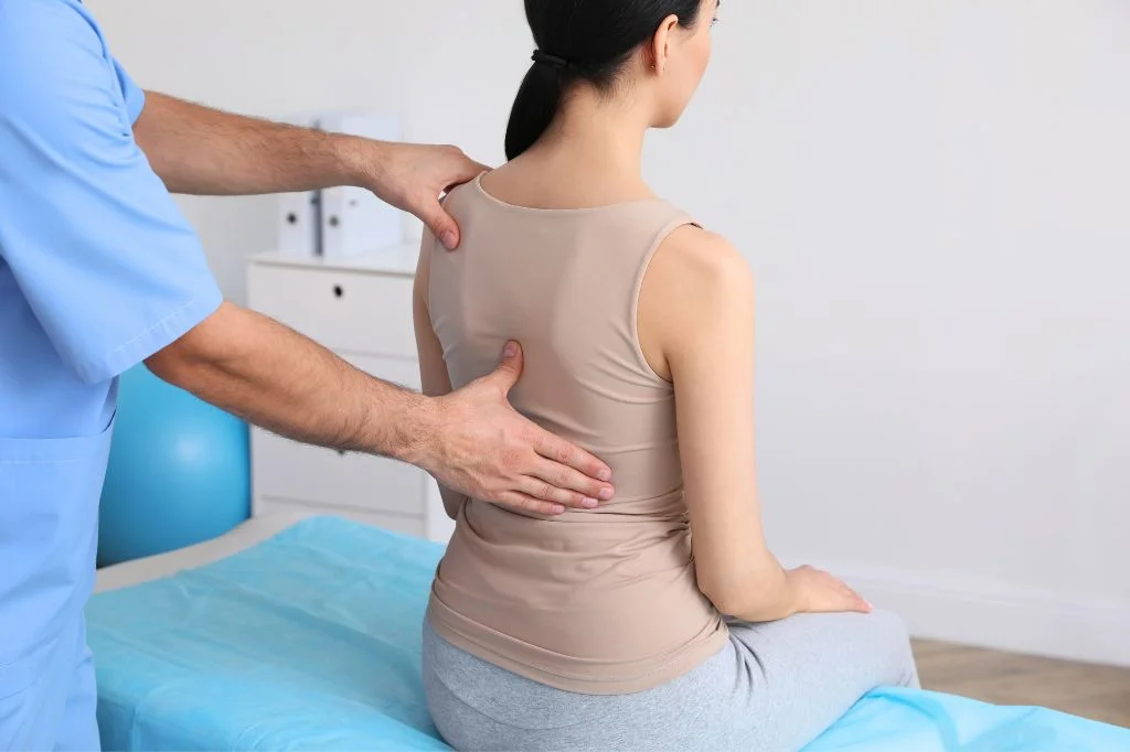 A formal medical screening for a clinical scoliosis management in Bali track at Hydro Medical Clinic Berawa.