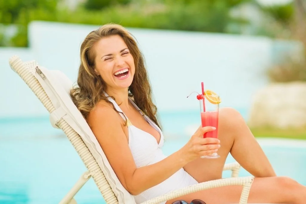 A tourist having a fresh and glowing face after using an anti aging skincare in Bali