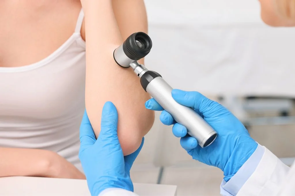 Dermatologist examining a patient's arm at a Bali clinic
