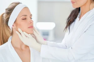 Dermatologist checking patient's face in a botox consultation