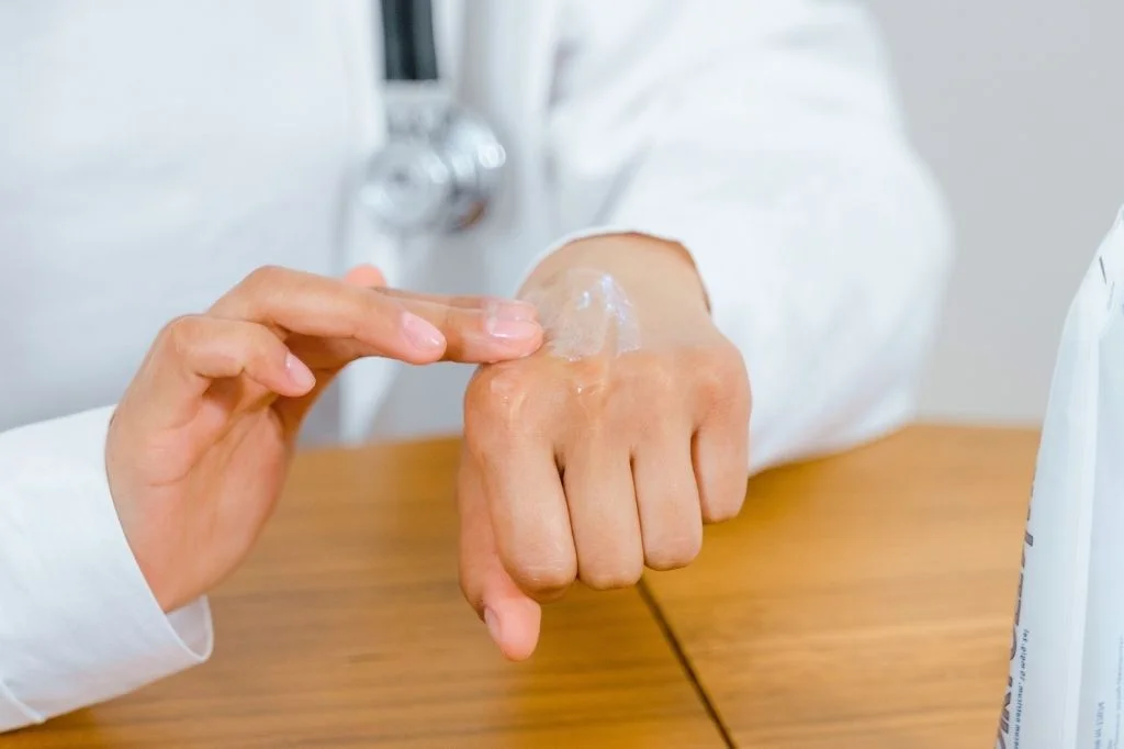 Dermatologist discussing an eczema treatment plan with a patient at a Bali clinic