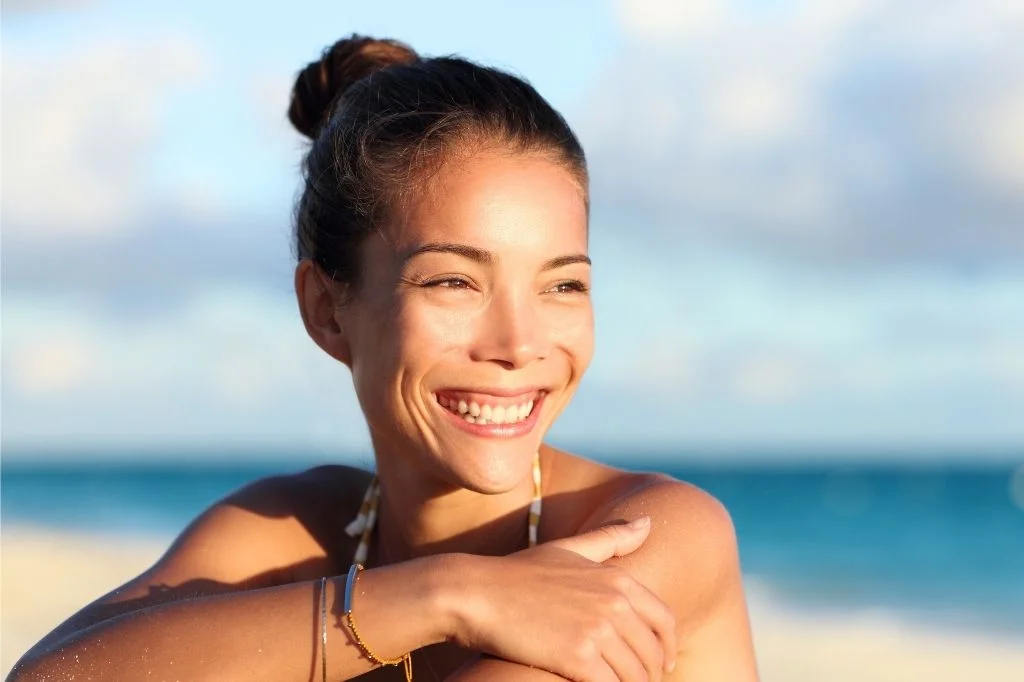 Traveler smiling and enjoying a Bali holiday with a natural, refreshed look after Botox