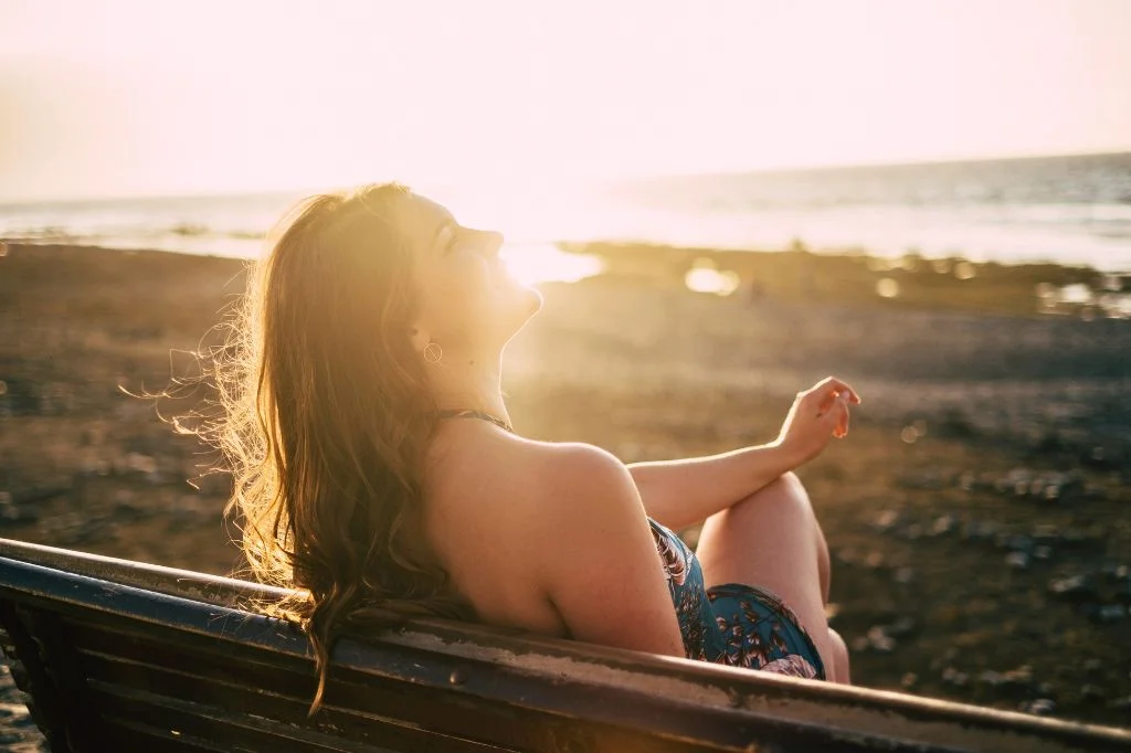 A healthy traveler enjoying Bali scenery after the dermoscopy treatment